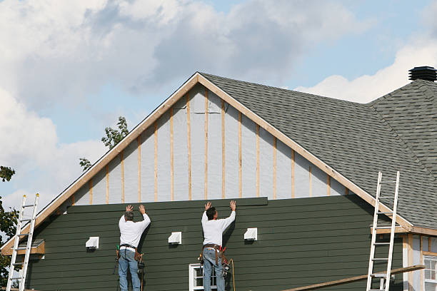 Professional Vinyl Siding technician working in West College Corner, IN